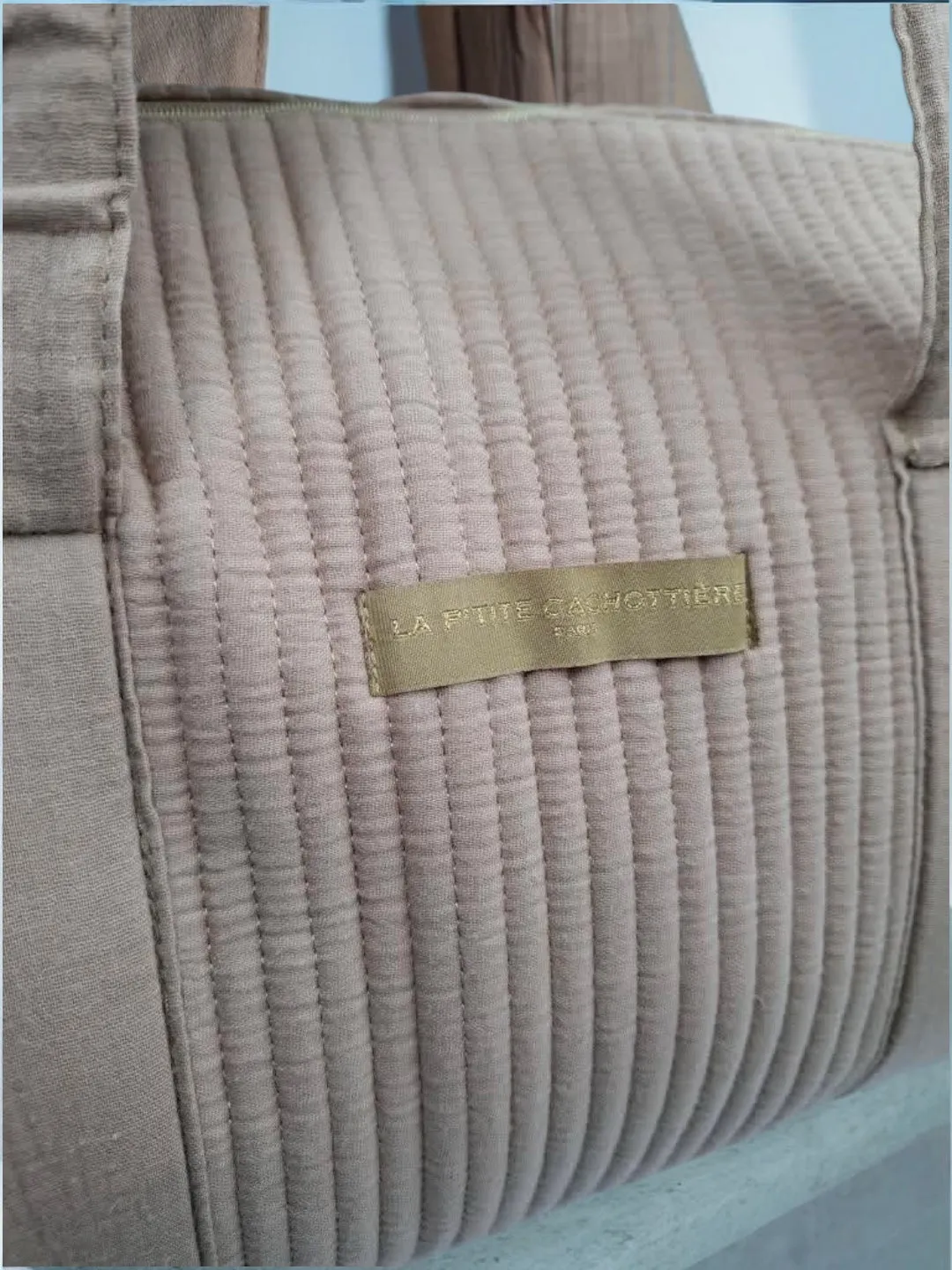 Sac polochon en coton matelassé beige 'La ptite cachotiere'